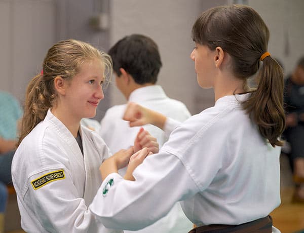 Two Tiger class students working a wrist-grab drill